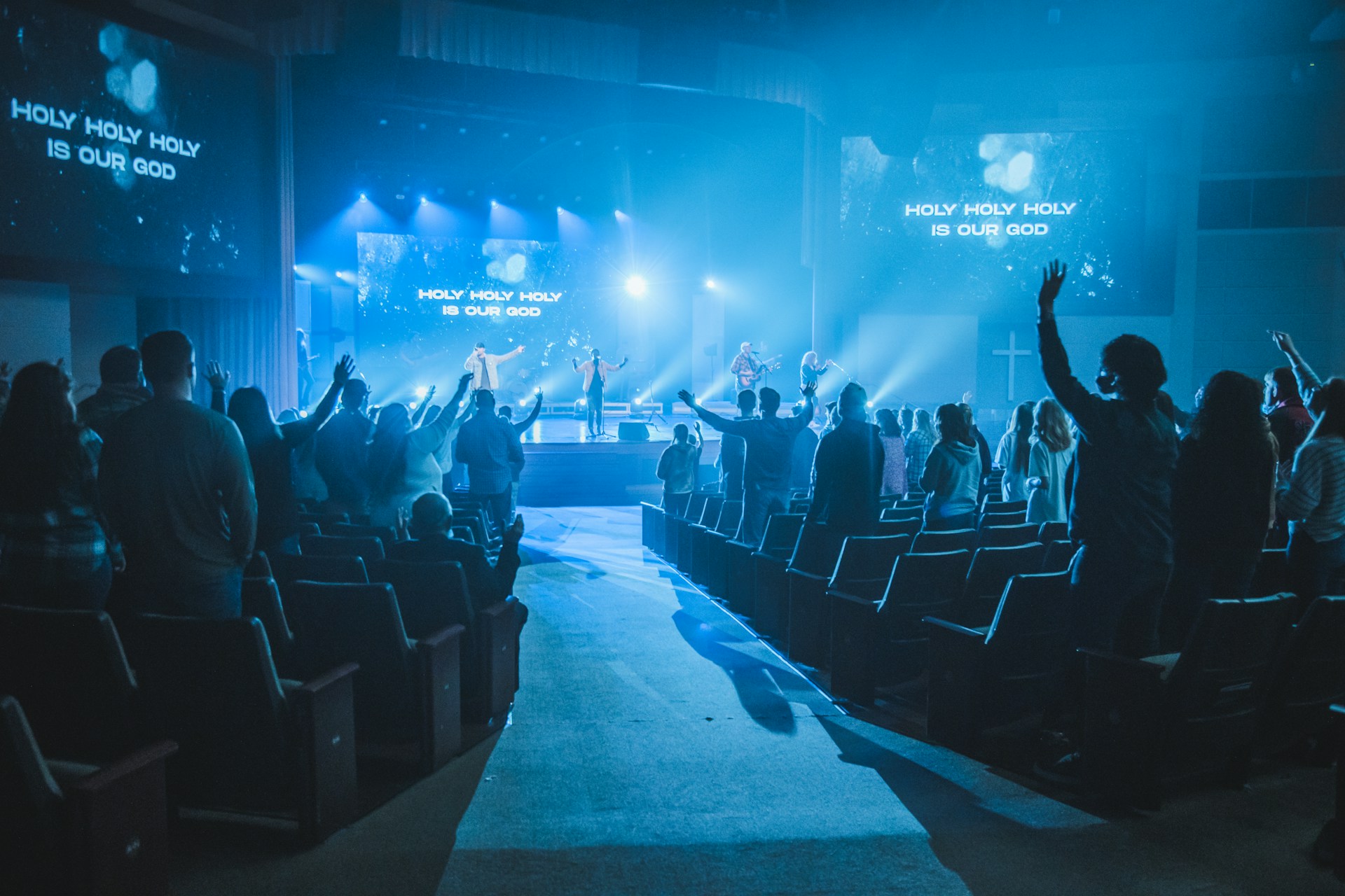 Hands raised in worship at church